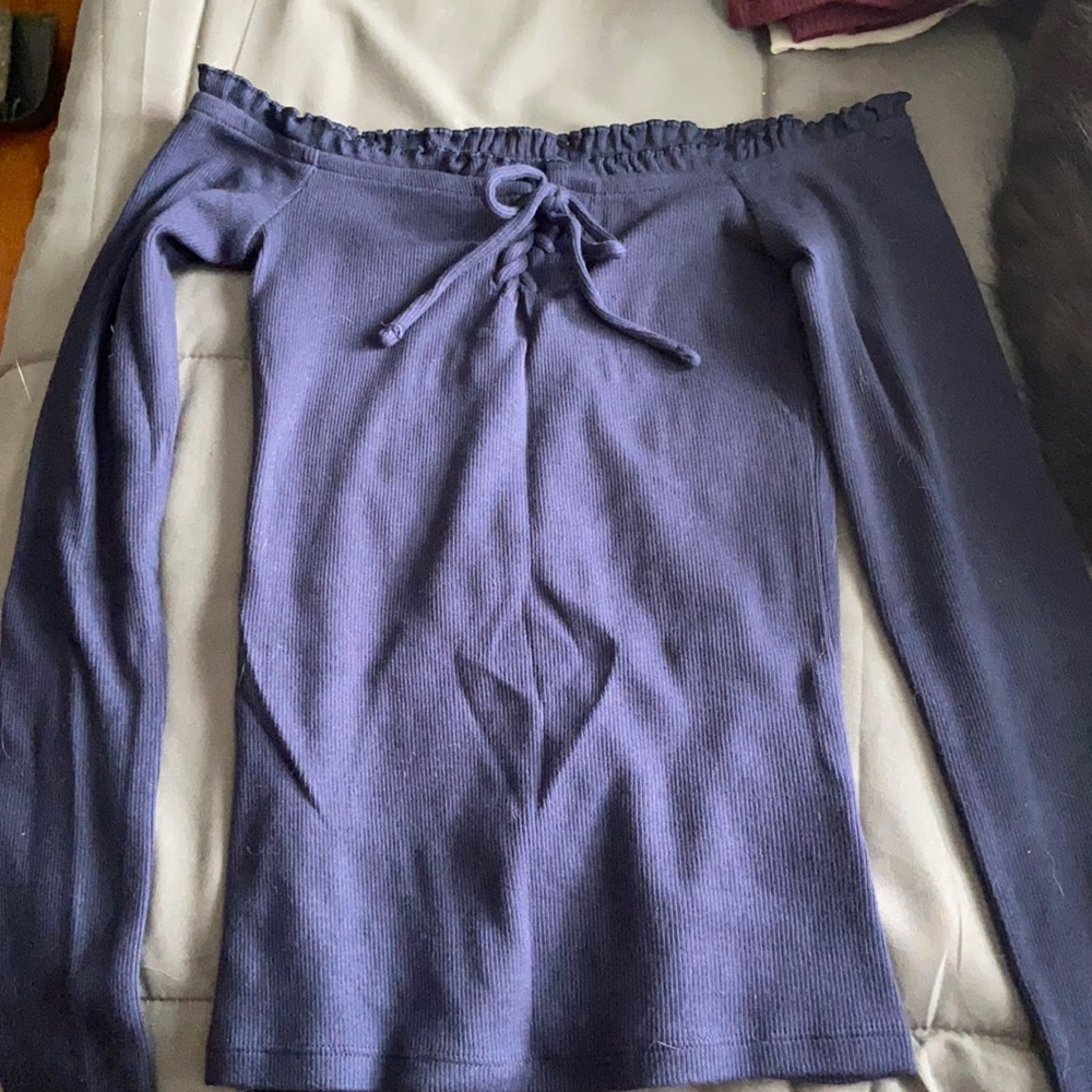 blue off the shoulder shirt